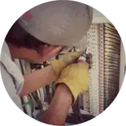 Expert technician inspecting a solar array for large commercial photovoltaic systems